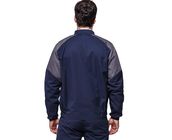 Las chaquetas grises/azul marino del trabajo industrial sujetaron con una cremallera y un velcro