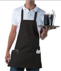 La prenda impermeable crea el desgaste del trabajo para requisitos particulares del restaurante que cocina delantales con los bolsillos